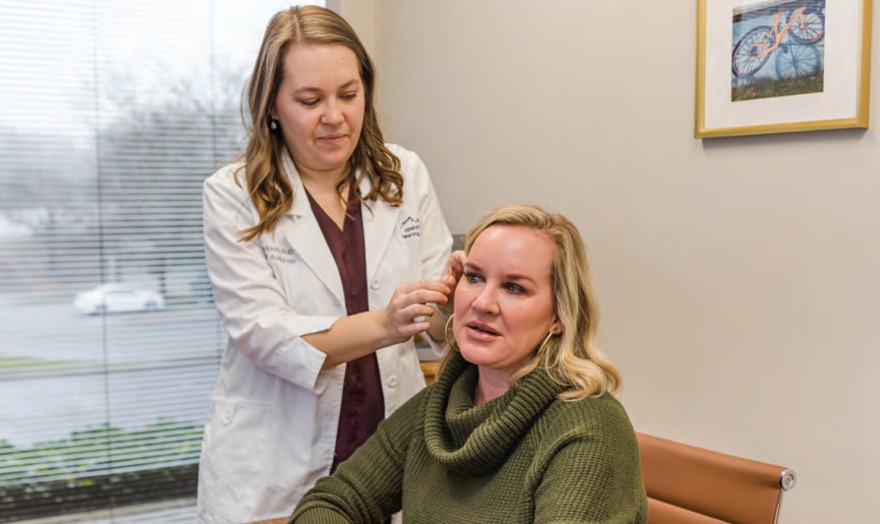 Dr. Kathryn Jackson of Upstate Hearing & Balance prepares a patient for hearing aid programming using “real ear” or probe microphone measures.