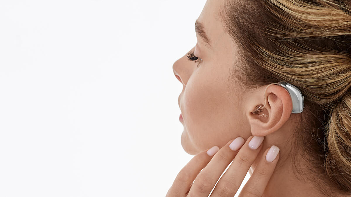 Woman wearing hearing aid - Ménière’s Disease