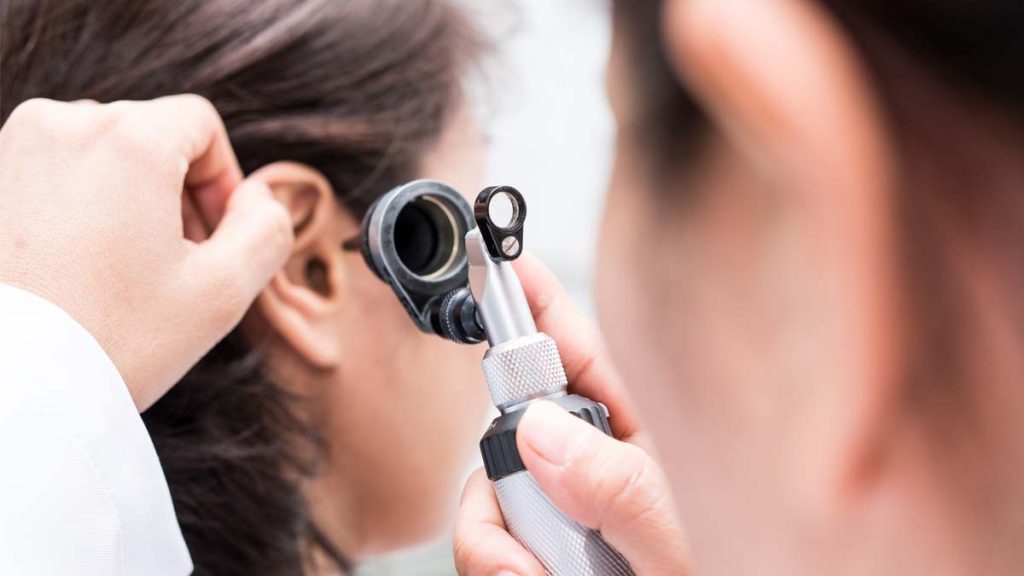 Photo of a doctor during a hearing exam